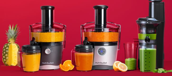 nutribullet® slow juice, nutribullet® juicer and nutribullet® juicer pro filled with yellow, orange and green juices next to their accessories and a pineapple and orange slices