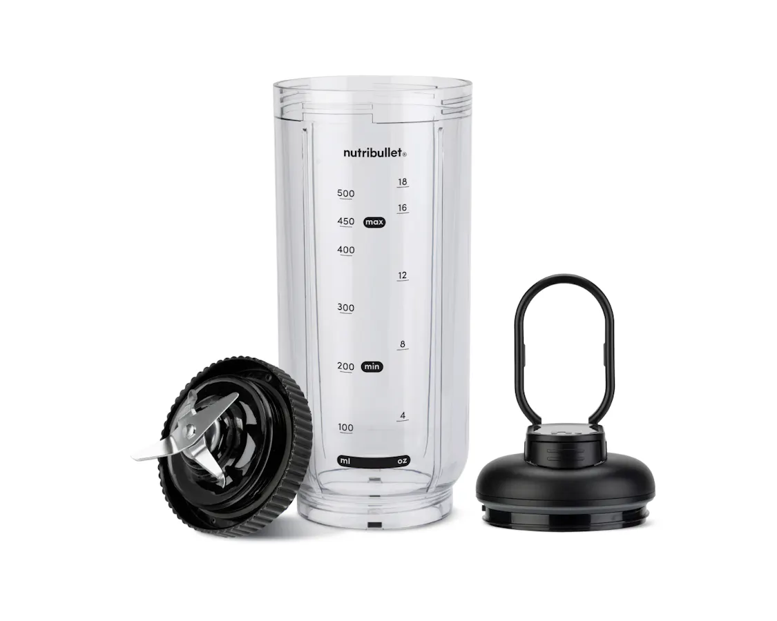 nutribullet Flex Accessory Set with clear 500ml blending cup, Black extractor blade lid, and black flip-top handle lid on white background.
