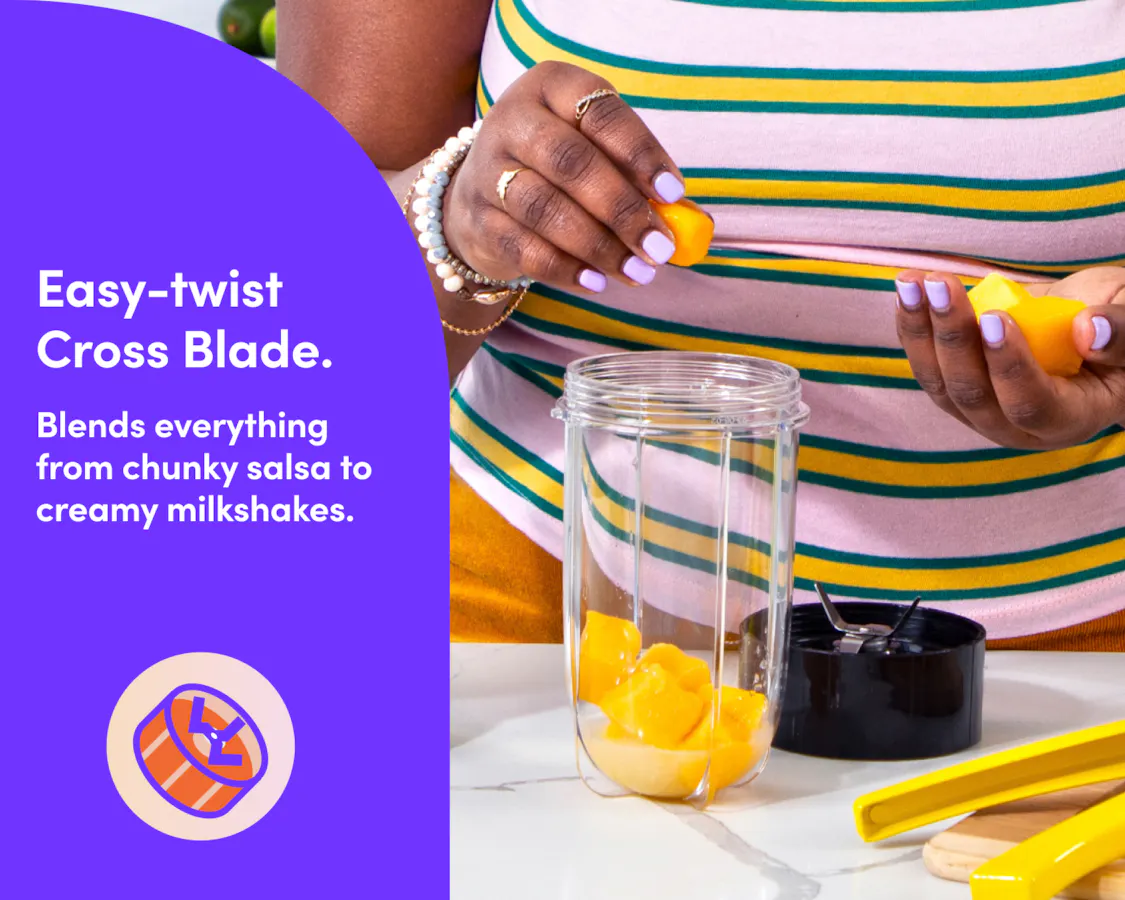 Person placing mango chunks into a magic bullet cup next to an easy-twist cross blade and text reading Easy-twist Cross Blade.