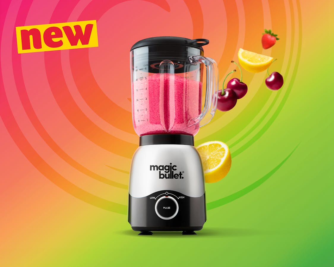 magic bullet Full-Sized Blender filled with smoothie on a colorfull background