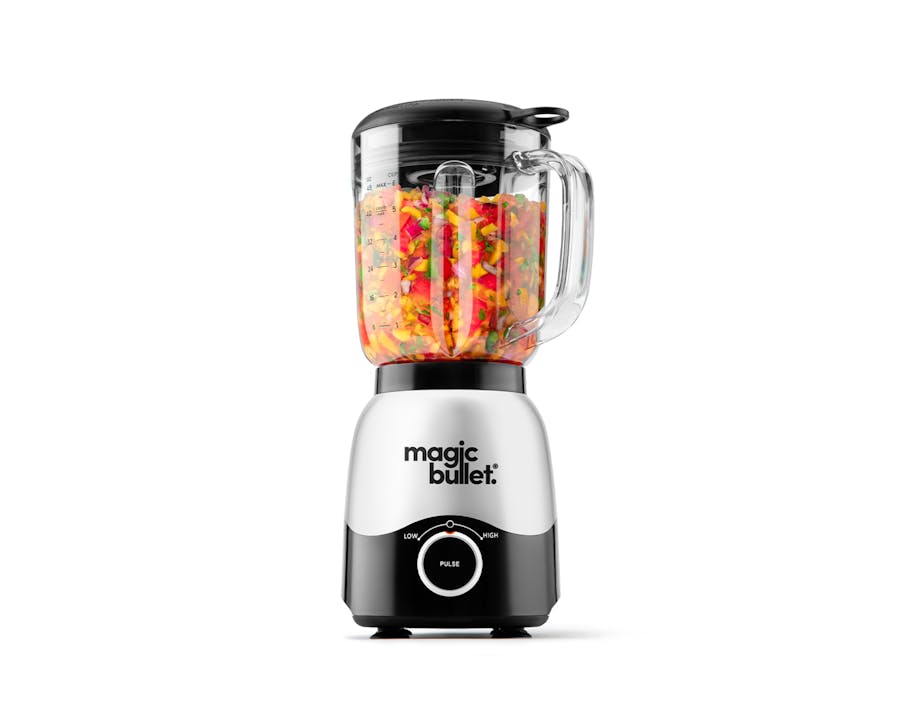 magic bullet Full-Sized Blender filled with fruits on a white background