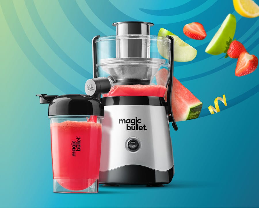Image of the magic bullet Mini Juicer and a cup filled with pink juice on a blue background.