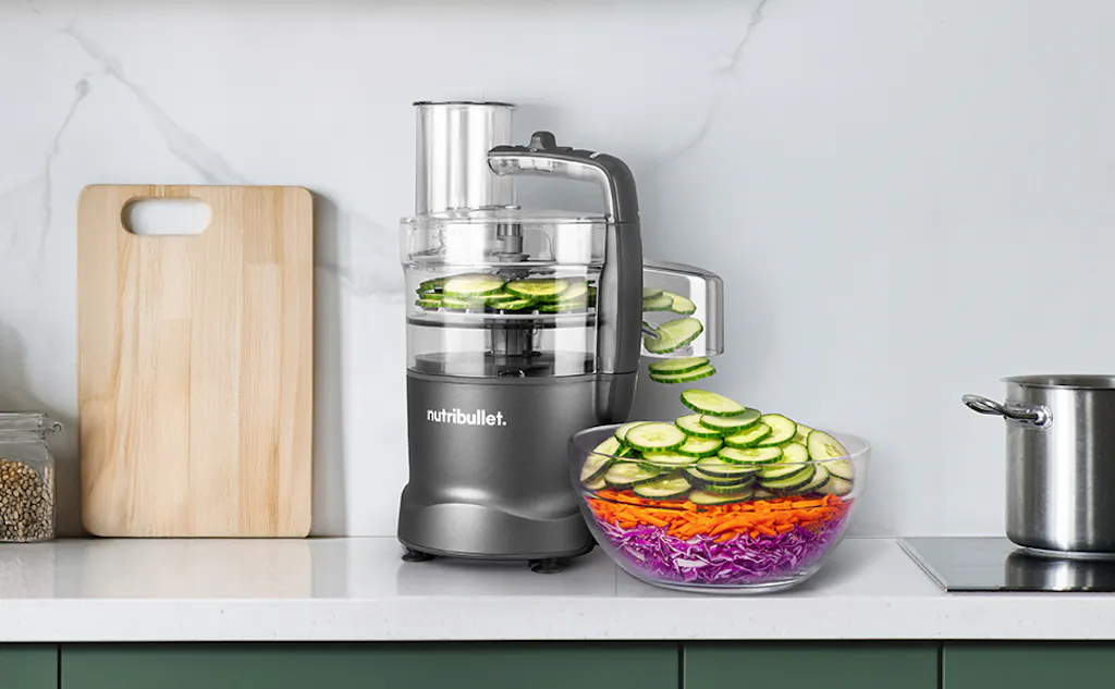 nutribullet Limitless Food Processor on the kitchen counter slicing fresh vegetables