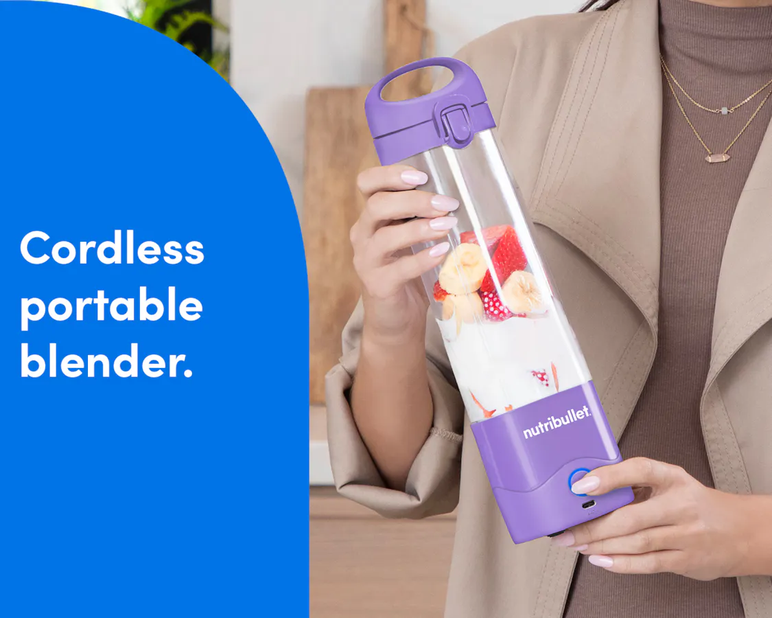 A woman dressed in beige holds the nutribullet Portable Blender, filled with fruit and ice. A blue panel on the left reads: "cordless portable blender."