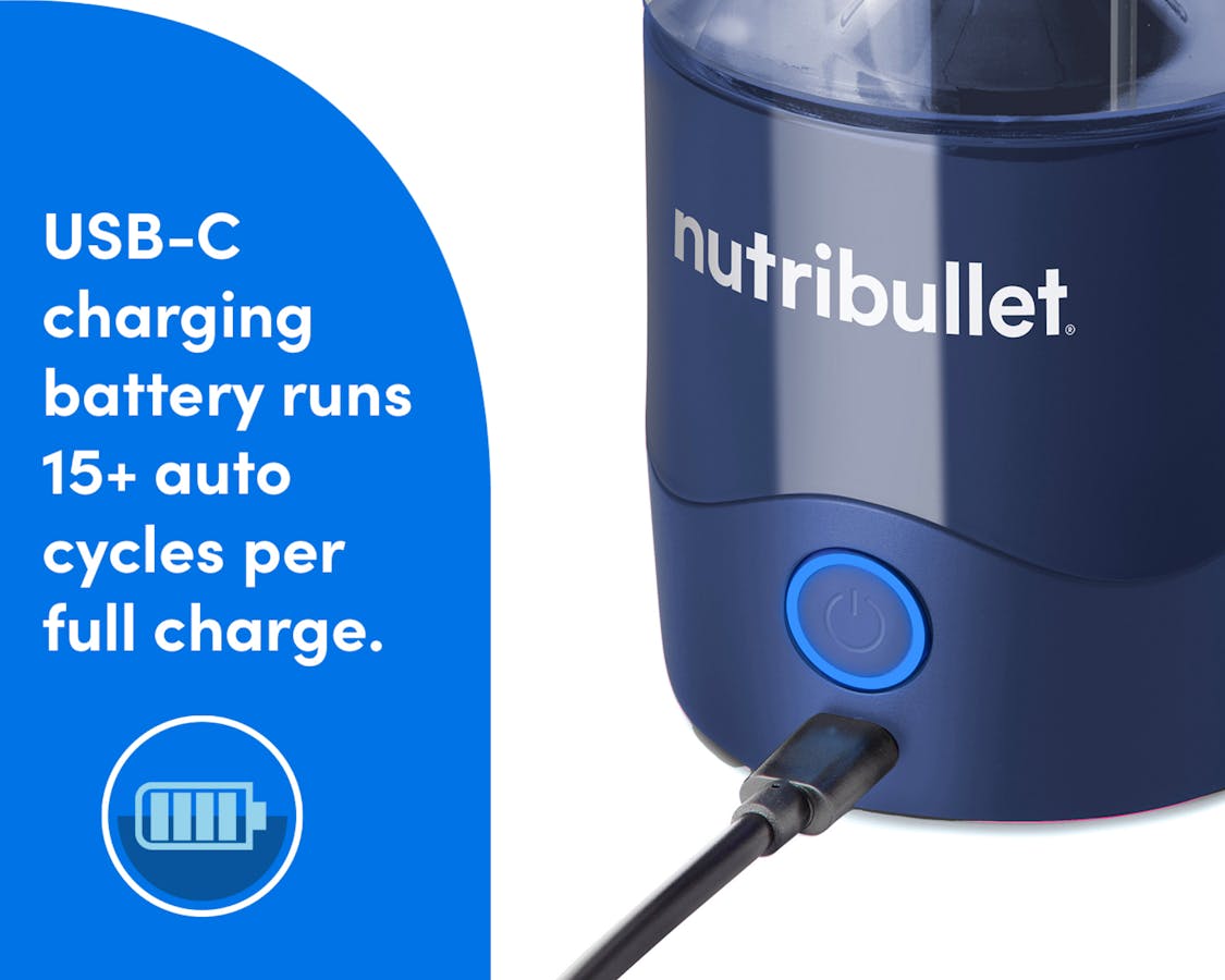 A closeup of the USB-C charger plugged into the charging port in the Power Base of the nutribullet Portable Blender. A blue panel on the left reads "USB-C-charging battery runs 15+ cycles per full charge" An icon showing a charged battery in a circle is situated beneath the text.