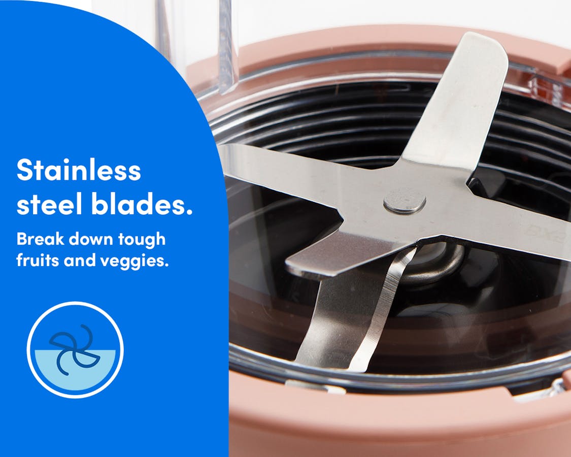 Closeup of the Extractor Blade attached to the Tall Cup and Power Base.