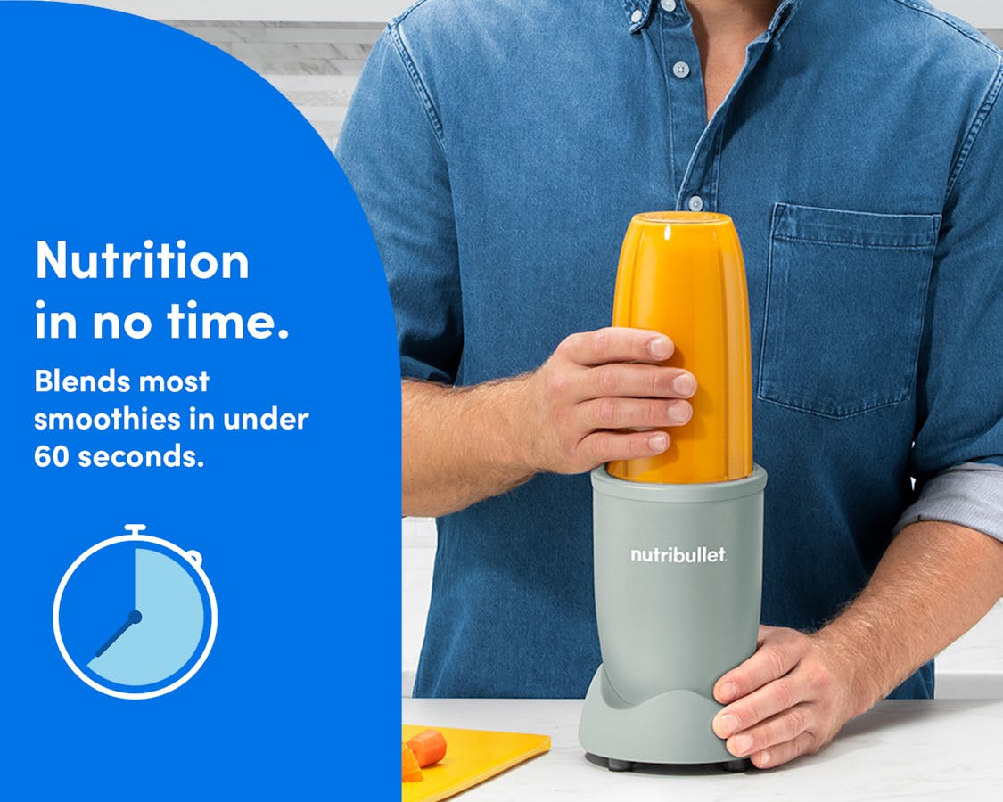 A man blends an orange smoothie in the nutribullet Pro.