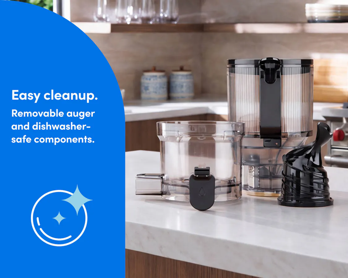 Juicer components shown clean and empty on a kitchen countertop.