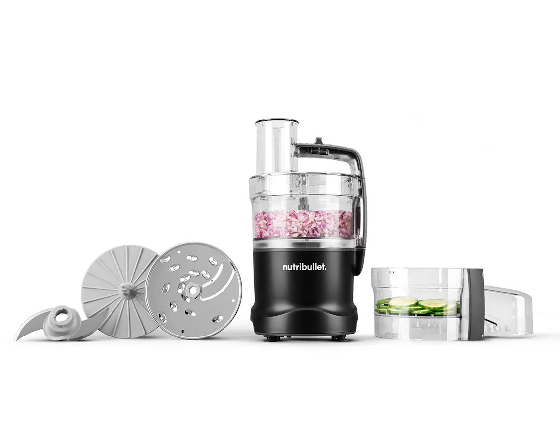 The nutribullet Limitless Food Processor displayed with its slicing disc, chopping blade, and feed chute components.