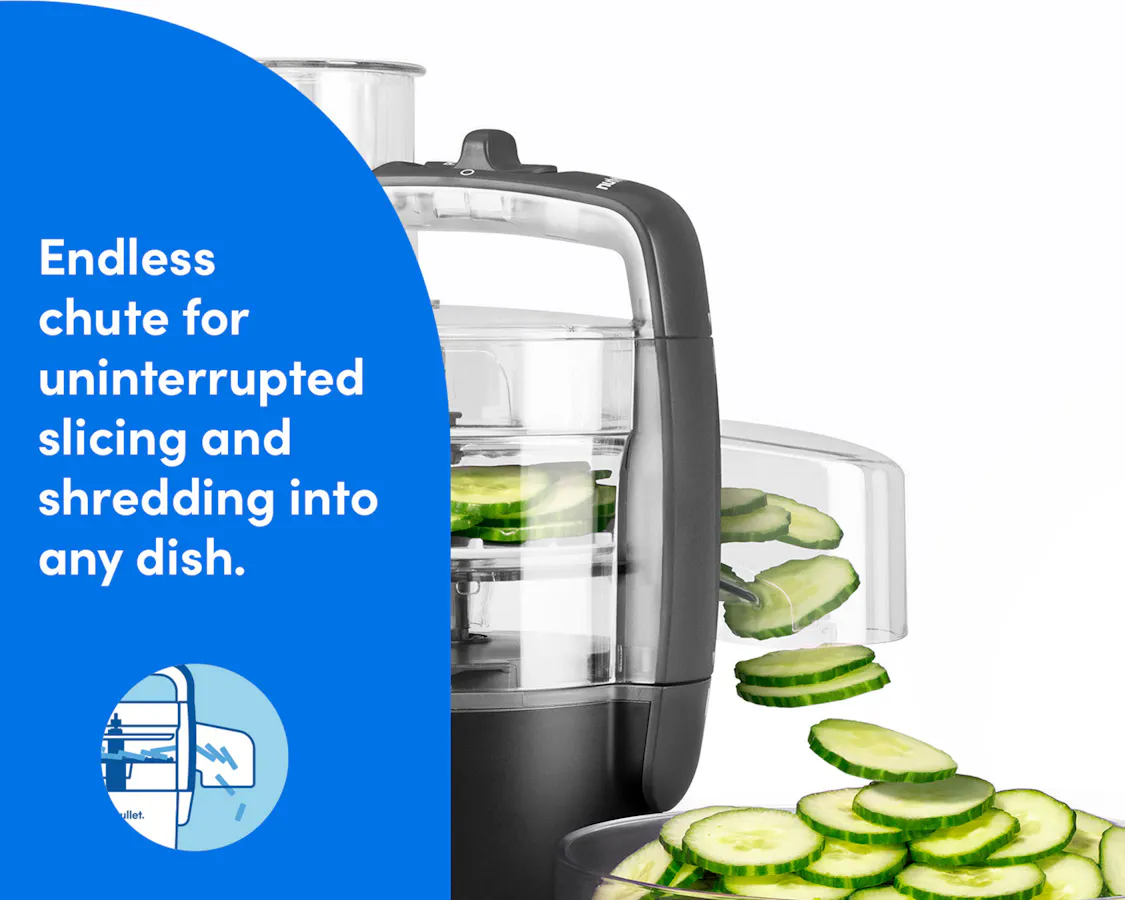 The nutribullet Limitless Food Processor shown slicing cucumbers through its endless chute attachment.