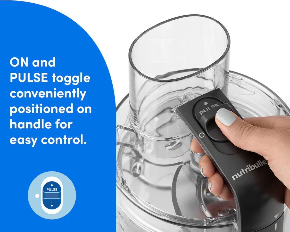 Close-up of a hand operating the ON and PULSE switch on the handle of the nutribullet Limitless Food Processor.