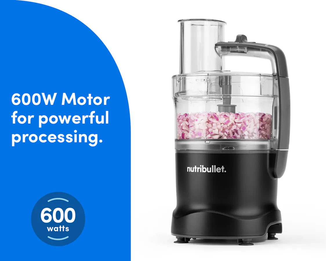 The Black nutribullet Limitless Food Processor chopping red onions, emphasizing its powerful 600-watt motor.