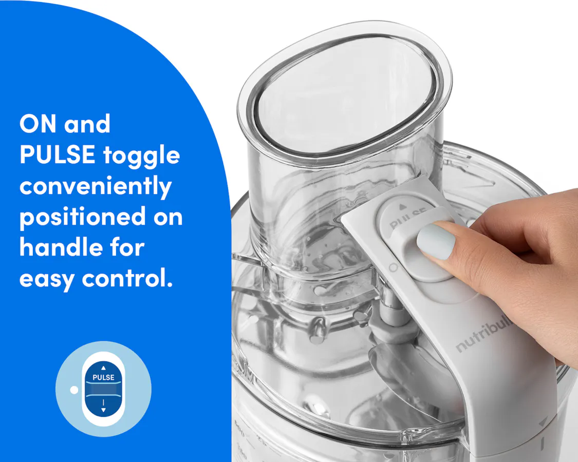 Close-up of a hand operating the ON and PULSE switch on the handle of the nutribullet Limitless Food Processor.