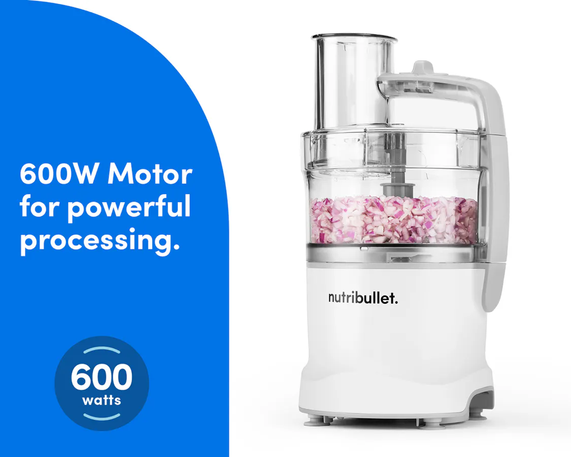 The White nutribullet Limitless Food Processor chopping red onions, emphasizing its powerful 600-watt motor.