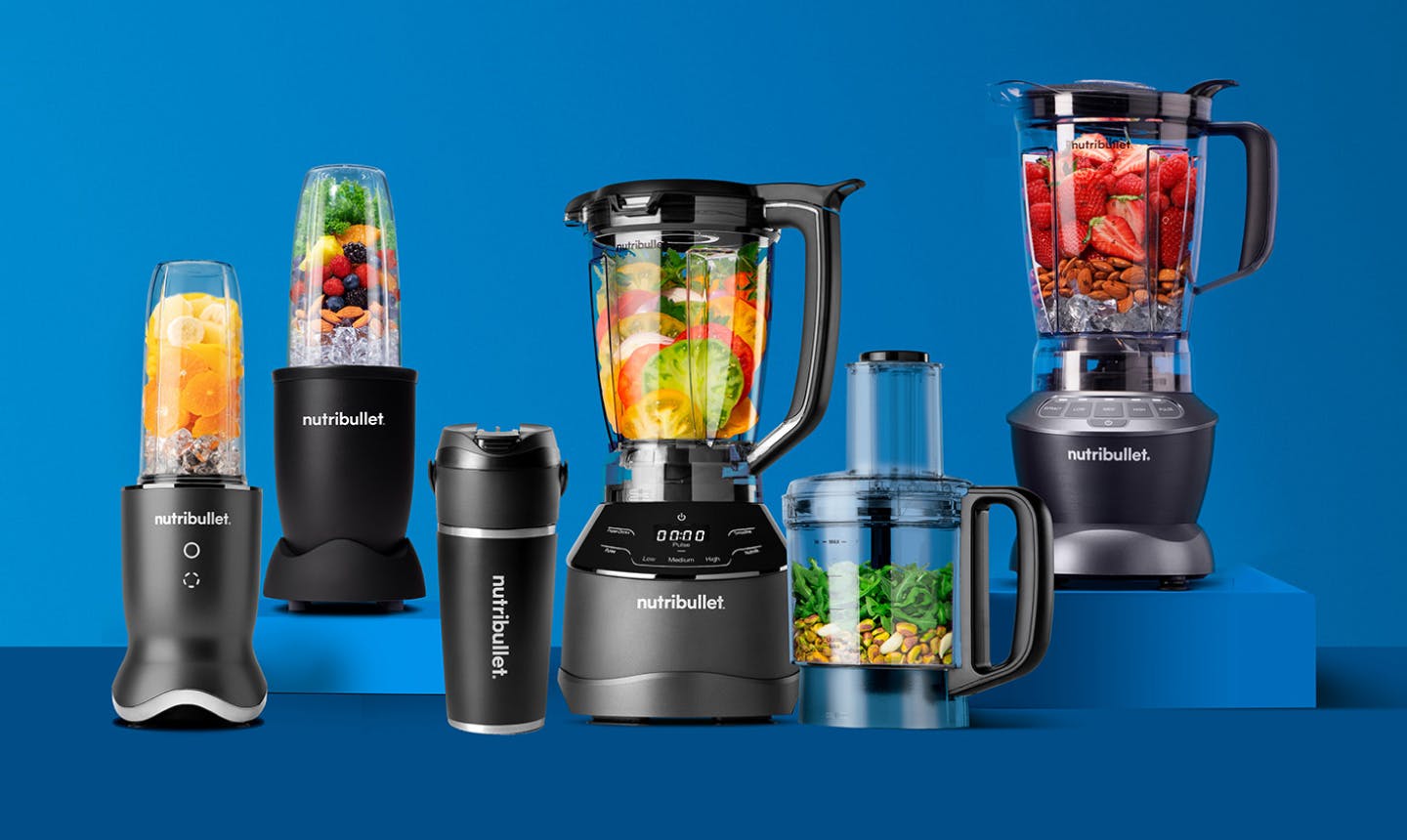 Collection of Nutribullet blenders, including Ultra, Pro 900, Flip, and Blender Combo, displayed on a kitchen counter.