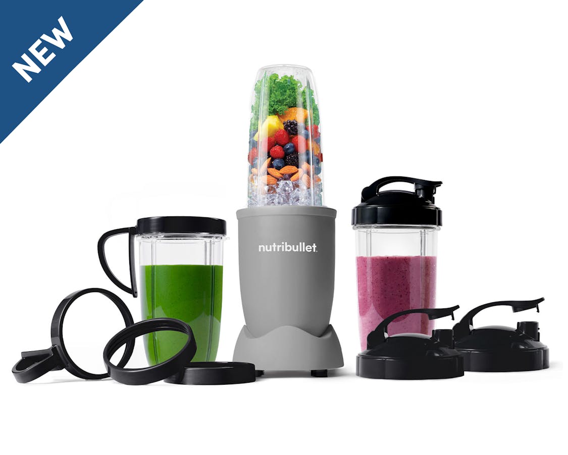 Grey nutribullet Pro, cups and lids filled with fruit and smoothies with new label