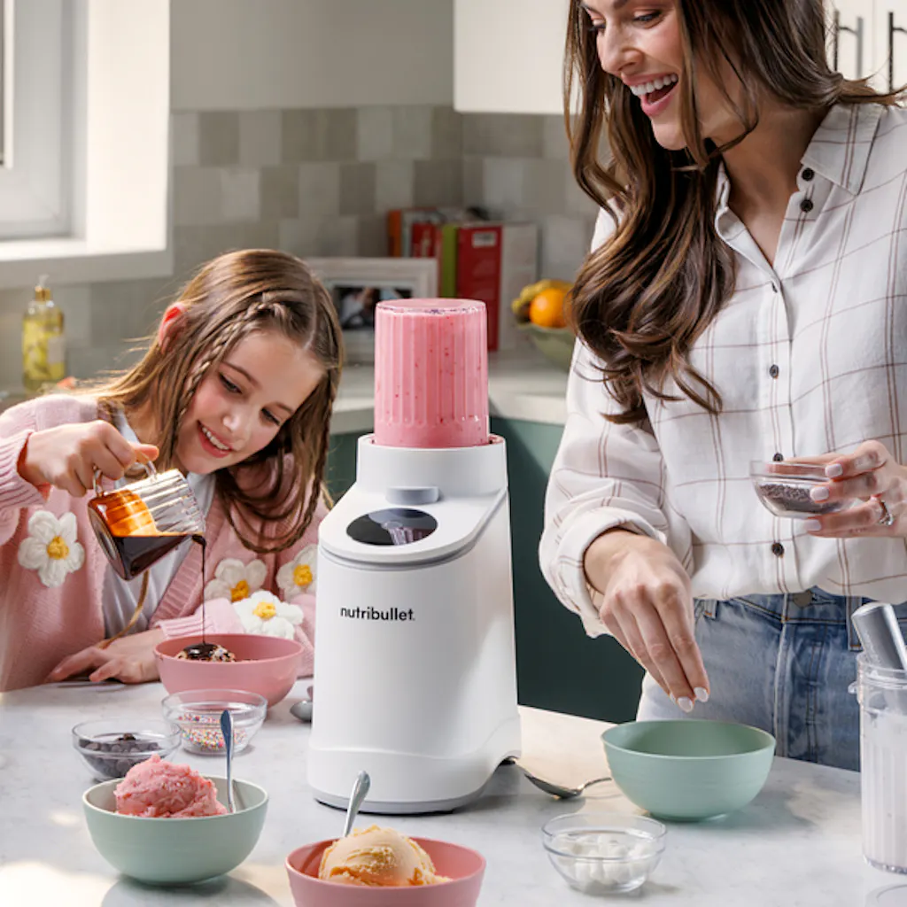 woman and child making ice cream with the nutribullet Chill