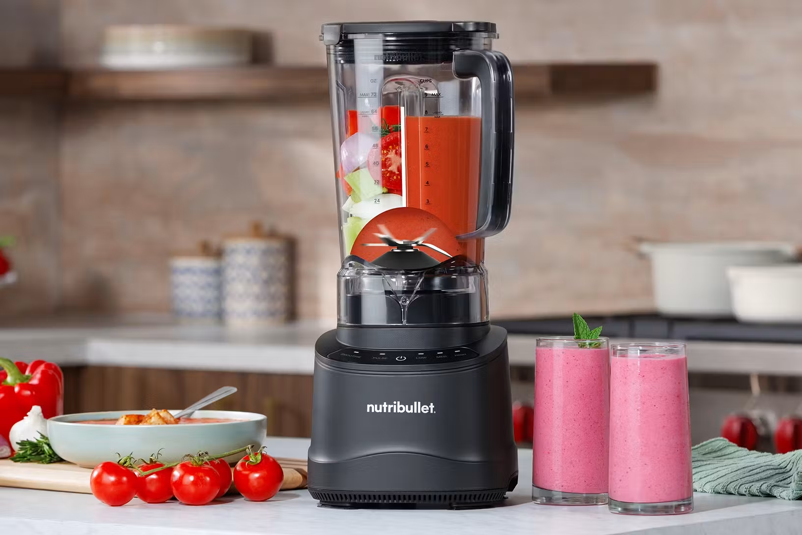 nutribullet PowerCore Blender in the kitchen with fresh ingredients for soup, salsa, and smoothies