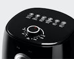 Product preview 6 of 9. Thumbnail of top of black air fryer with temperature adjustment knob and buttons.