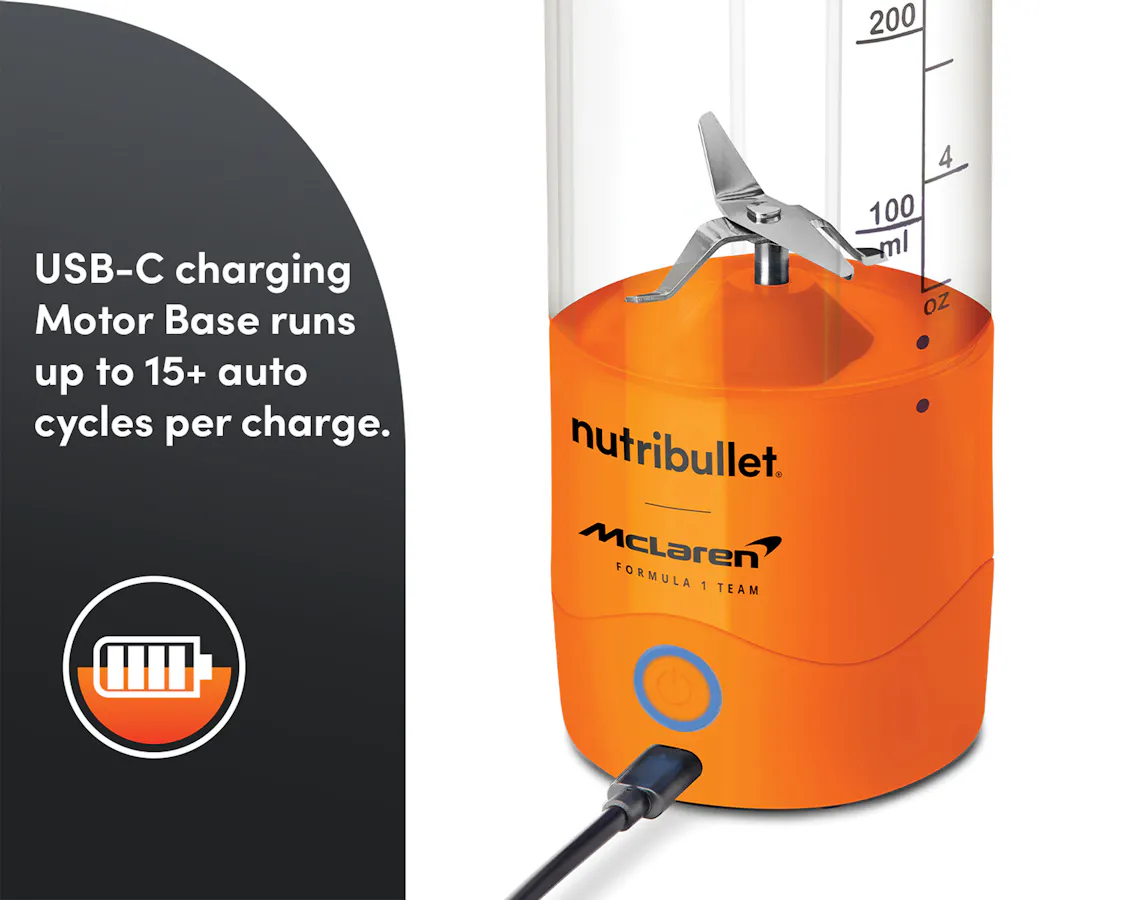Closeup of the nutribullet® x McLaren: Portable Blender base while charging. A panel with text refrences the blender's charging power with an icon below.
