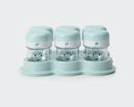 Product preview 7 of 9. Thumbnail set of six blue and clear nutribullet Baby storage cups and lids with smiley faces on cups.