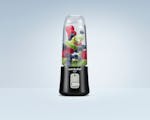 Product preview 2 of 10. Thumbnail of black nutribullet GO with fruit in blender on blue background.