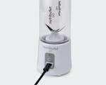 Product preview 6 of 10. Thumbnail of white nutribullet GO with cord plugged in.