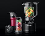 Product preview 2 of 8. Thumbnail of black nutribullet Smart Touch Blender Combo with pitcher and cups filled with fruit, smoothies with black lids.