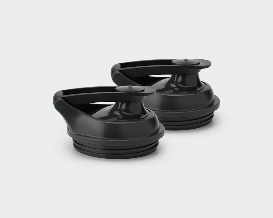 nutribullet Smart Touch Blender set of two to-go lids on gray background.