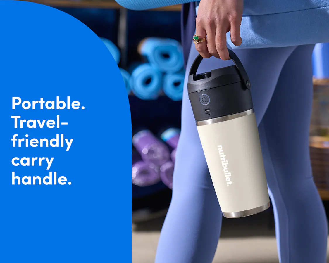Woman holding the nutribullet Flip. Portable travel-friendly carry handle.