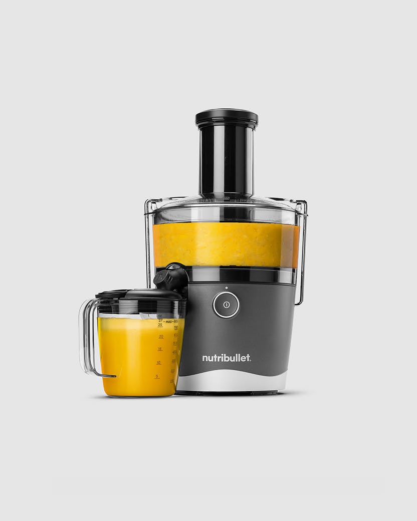 nutribullet centrifugal juicers shown with colorful fresh juice and fruits.