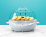 Product preview 2 of 8. Thumbnail white nutribullet Baby Steamer filled with  veggies with teal accents on teal background.